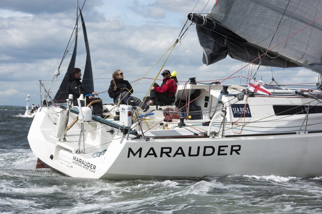 Marisa trims the main on Marcus Cochran’s Class40 Marauder (Jamestown, RI). © Allen Clark/PhotoBoat.com